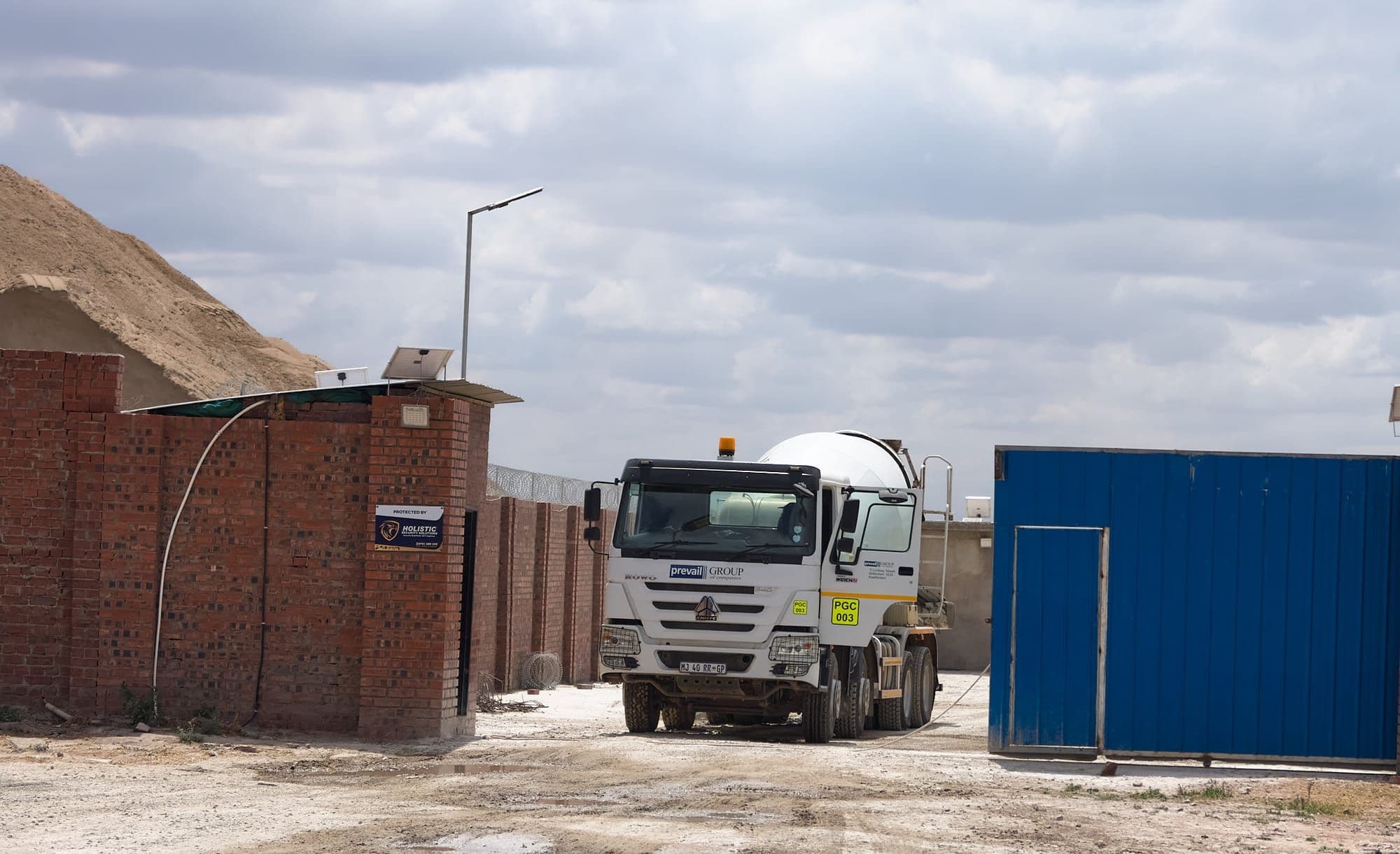 A Prevail Concrete transit mixer leaving the yard on a delivery